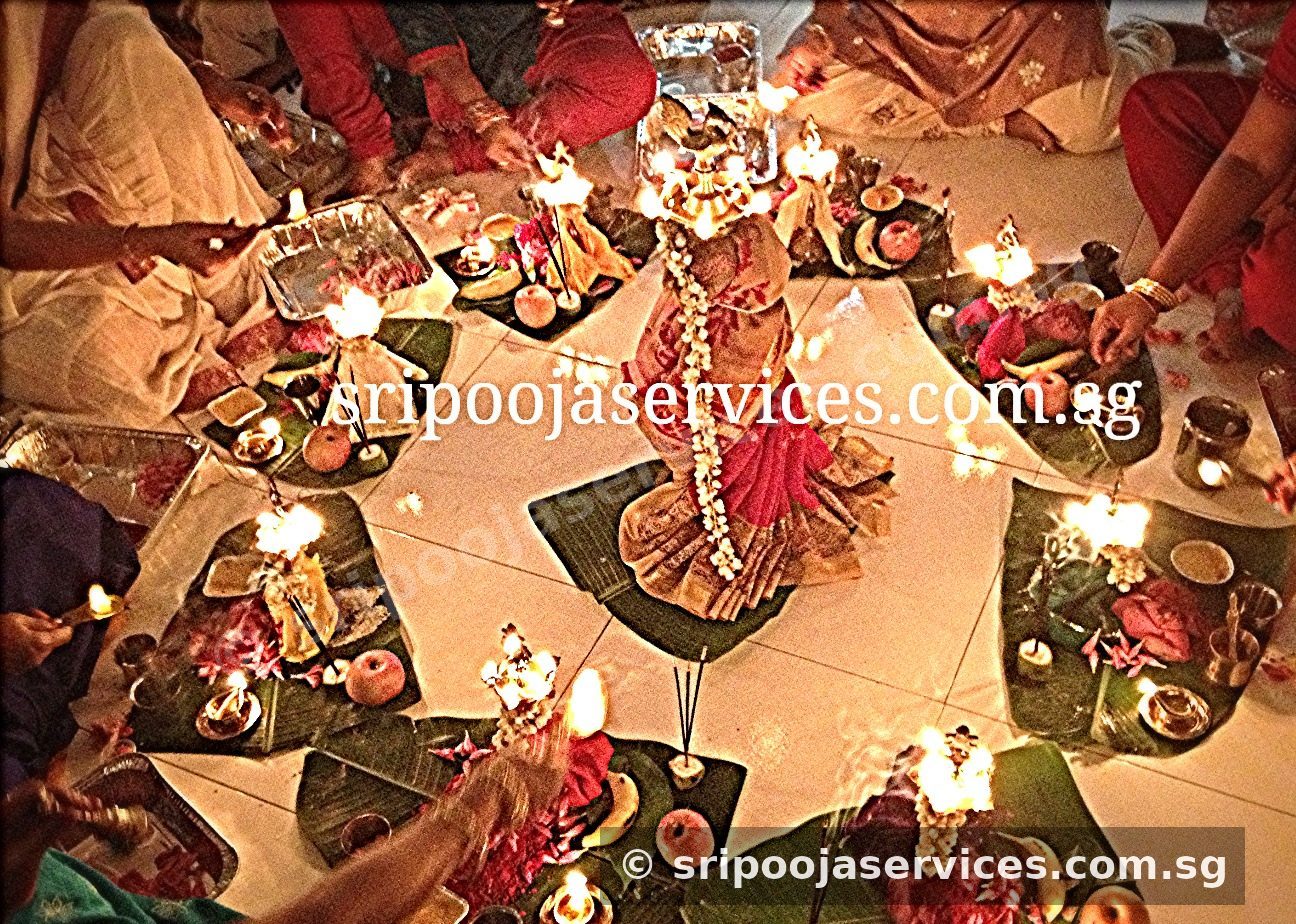Pooja arrangement with lamps